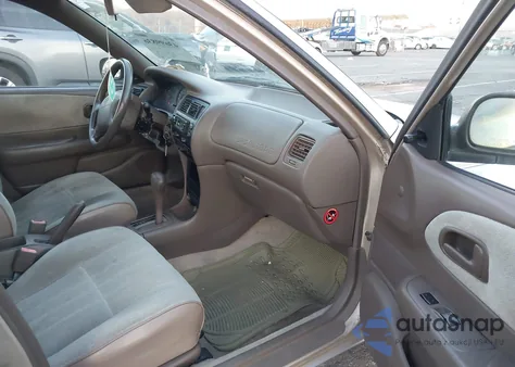 1997 Toyota Corolla Ce из США, поврежденный, VIN 1NXBA02E1VZ553167